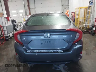 2018 Honda Civic EX-T with VIN JHMFC1F35JX031132, listed as a IAAI auction lot 41591028 with 111,087 mi miles and . Bid and sale history available at DreamBid. Image 16.