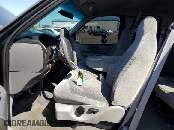 1999 Ford F-150 XL с VIN 2FTRX08L4XCA00426, выставлен на аукционе Copart как лот 68354464 с пробегом 157 539 миль миль и Списание • Salvage title. История ставок и продаж доступна на DreamBid. Изображение 7.