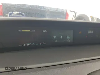 2021 Toyota Prius L Eco с VIN JTDKAMFU5M3142128, выставлен на аукционе Copart как лот 73832324 с пробегом 21 460 миль миль и Списание • Salvage title. История ставок и продаж доступна на DreamBid. Изображение 9.