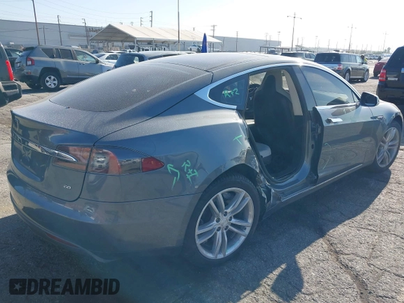 2014 Tesla Model S 60 with VIN 5YJSA1S11EFP35998, listed as a IAAI auction lot 42316563 with 83,835 mi miles and . Bid and sale history available at DreamBid. Image 6.