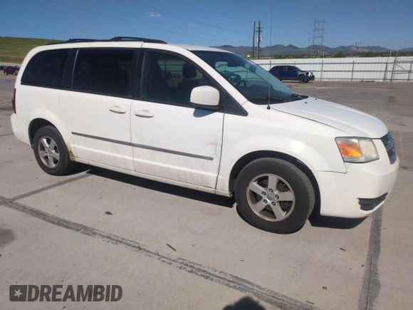 2010 Dodge Grand Caravan SXT with VIN 2D4RN5D16AR444938, listed as a Copart auction lot 56762695 with 251,437 mi miles and Clean Title. Bid and sale history available at DreamBid. Image 4.
