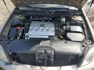 2002 Cadillac DeVille DHS z VIN 1G6KE57Y32U107755, wystawiony jako Copart lot #52811235 z przebiegiem 111 141 mil mil oraz Nie do naprawy. Historia ofert i sprzedaży dostępna na DreamBid. Obrazek 11.