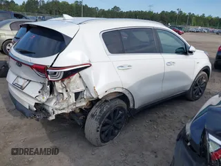 2018 Kia Sportage EX with VIN KNDPNCAC6J7442364, listed as a IAAI auction lot 42012509 with 217,245 mi miles and . Bid and sale history available at DreamBid. Image 4.