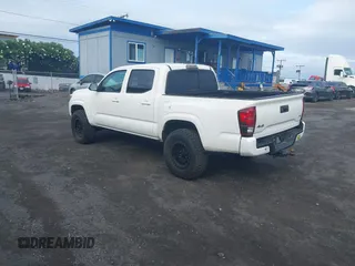 2023 Toyota Tacoma SR with VIN 3TYCZ5AN4PT168312, listed as a IAAI auction lot 42555775 with 8,288 mi miles and . Bid and sale history available at DreamBid. Image 3.