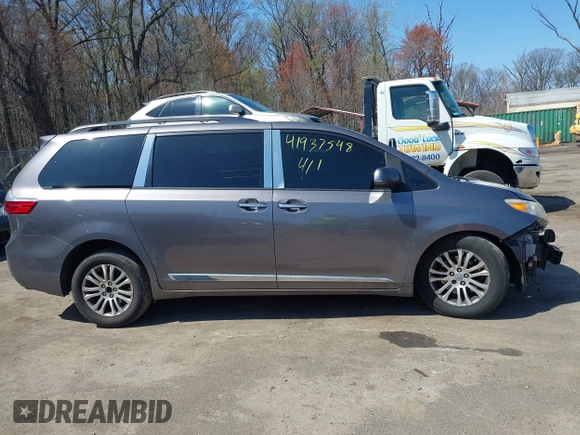2015 Toyota Sienna XLE with VIN 5TDYK3DC6FS645065, listed as a IAAI auction lot 41937548 with 355,732 mi miles. Bid and sale history available at carsss.com. Image 13.