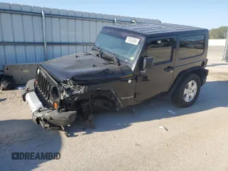 2010 Jeep Wrangler Sahara z VIN 1J4AA5D1XAL227305, wystawiony jako Copart lot #70165554 z przebiegiem Nie podano mil oraz Szkoda całkowita • Salvage title. Historia ofert i sprzedaży dostępna na DreamBid. Obrazek 1.