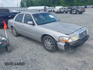 2004 Mercury Grand Marquis LS Premium z VIN 2MHFM75W84X658355, wystawiony jako IAAI lot #42166597 z przebiegiem 214 858 mil mil oraz . Historia ofert i sprzedaży dostępna na DreamBid. Obrazek 1.