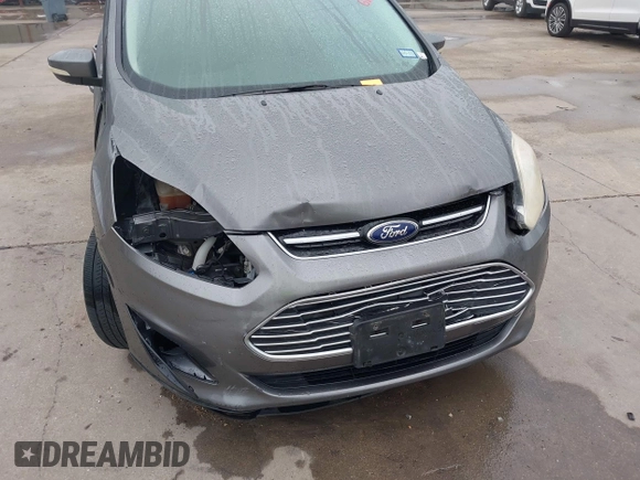 2013 Ford C-Max SE with VIN 1FADP5AUXDL535889, listed as a IAAI auction lot 42161407 with 103,978 mi miles and . Bid and sale history available at DreamBid. Image 6.