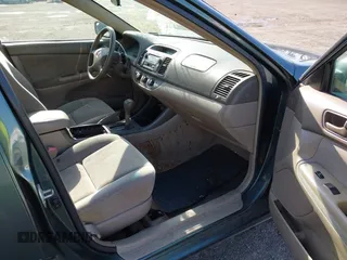 2004 Toyota Camry LE with VIN 4T1BF32K04U074276, listed as a IAAI auction lot 41940050 with 266,420 mi miles and . Bid and sale history available at DreamBid. Image 5.