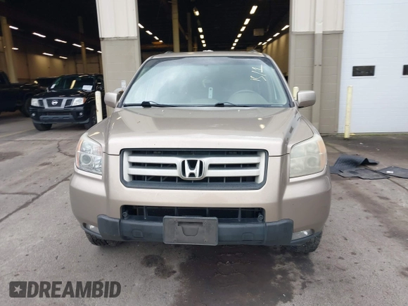 2006 Honda Pilot EX-L with VIN 2HKYF18516H528116, listed as a IAAI auction lot 41782324 with 245,280 mi miles and . Bid and sale history available at DreamBid. Image 12.