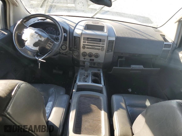 2005 Nissan Titan SE with VIN 1N6AA07B65N566549, listed as a Copart auction lot 80915034 with 268,827 mi miles and Salvage Title. Bid and sale history available at carsss.com. Image 8.