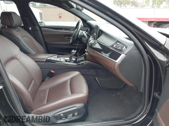 2014 BMW 5 Series 535d with VIN WBAXA5C59ED690375, listed as a IAAI auction lot 42030902 with 70,553 mi miles and . Bid and sale history available at carsss.com. Image 5.
