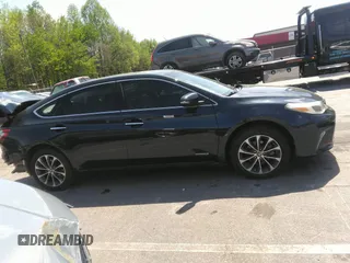 2018 Toyota Avalon Hybrid XLE Plus z VIN 4T1BD1EB1JU062378, wystawiony jako IAAI lot #41988148 z przebiegiem 128 220 mil mil oraz . Historia ofert i sprzedaży dostępna na DreamBid. Obrazek 14.