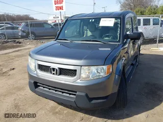 2011 Honda Element EX with VIN 5J6YH2H77BL001747, listed as a IAAI auction lot 41827107 with 119,567 mi miles. Bid and sale history available at carsss.com. Image 17.