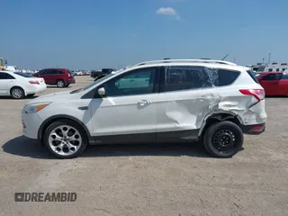 2015 Ford Escape Titanium with VIN 1FMCU0JX4FUB07322, listed as a IAAI auction lot 42220345 with 184,852 mi miles and . Bid and sale history available at DreamBid. Image 14.
