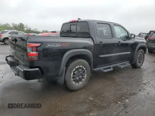 2022 Nissan Frontier Pro-4X z VIN 1N6ED1EK4NN686366, wystawiony jako Copart lot #57396085 z przebiegiem 50 753 mil mil oraz Szkoda całkowita • Salvage title. Historia ofert i sprzedaży dostępna na DreamBid. Obrazek 3.