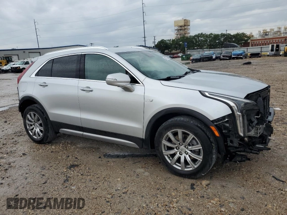 2021 Cadillac XT4 FWD Premium Luxury with VIN 1GYFZCR48MF083164, listed as a Copart auction lot 55377235 with 63,987 mi miles and Salvage title. Bid and sale history available at DreamBid. Image 4.