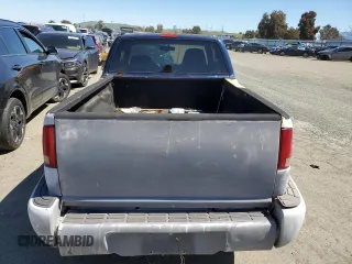 2000 GMC Sonoma SLS z VIN 1GTCS19W0Y8206050, wystawiony jako Copart lot #49122164 z przebiegiem 264 070 mil mil oraz Szkody całkowita. Historia ofert i sprzedaży dostępna na DreamBid. Obrazek 6.