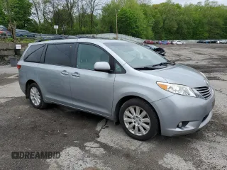 2015 Toyota Sienna Limited with VIN 5TDDK3DC5FS118715, listed as a Copart auction lot 55957215 with 133,500 mi miles and Salvage title. Bid and sale history available at DreamBid. Image 4.