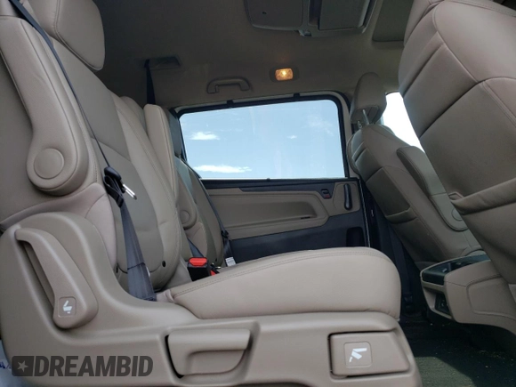 2024 Honda Odyssey Touring with VIN 5FNRL6H84RB024909, listed as a Copart auction lot 56226255 with 11,094 mi miles and Salvage title. Bid and sale history available at DreamBid. Image 11.