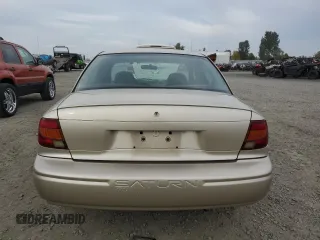 2001 Saturn SL z VIN 1G8ZH52831Z348124, wystawiony jako Copart lot #76058854 z przebiegiem 191 465 mil mil oraz Szkoda całkowita • Salvage title. Historia ofert i sprzedaży dostępna na DreamBid. Obrazek 6.