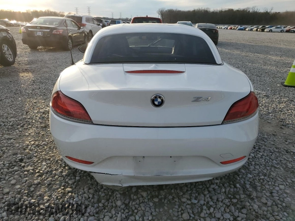 2012 BMW Z4 sDrive28i with VIN WBALL5C59CJ103051, listed as a Copart auction lot 87015834 with 92,071 mi miles and Salvage title. Bid and sale history available at DreamBid. Image 6.
