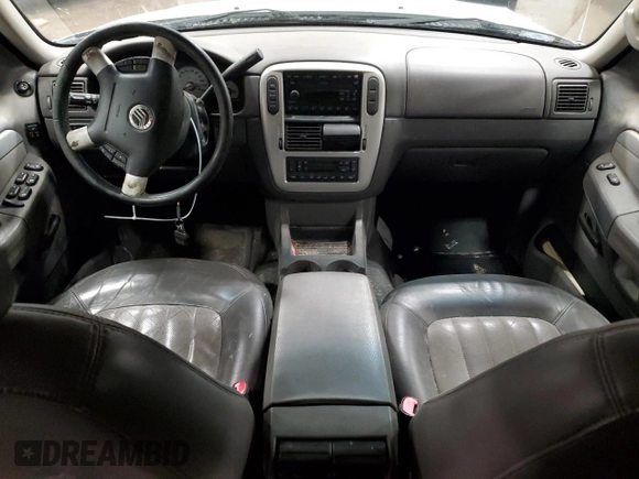 2002 Mercury Mountaineer z VIN 4M2DU86W62ZJ26324, wystawiony jako Copart lot #45649415 z przebiegiem 191 927 mil mil oraz Nie do naprawy. Historia ofert i sprzedaży dostępna na DreamBid. Obrazek 8.