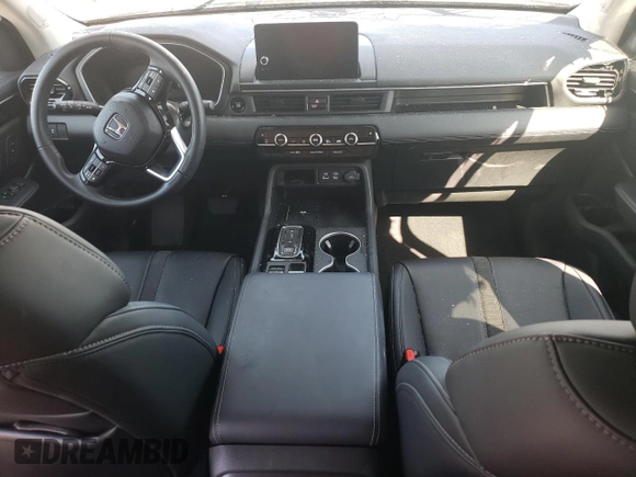 2023 Honda Pilot Touring with VIN 5FNYG2H7XPB011420, listed as a Copart auction lot 69799314 with 9,601 mi miles and Salvage Title. Bid and sale history available at DreamBid. Image 8.