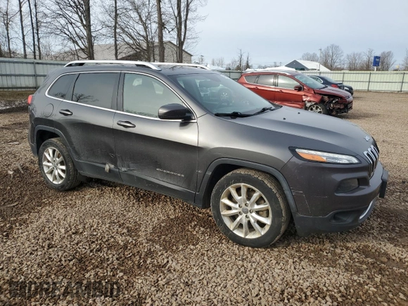 2015 Jeep Cherokee Limited with VIN 1C4PJLDB7FW701648, listed as a Copart auction lot 49612655 with 118,760 mi miles and Salvage Title. Bid and sale history available at DreamBid. Image 4.
