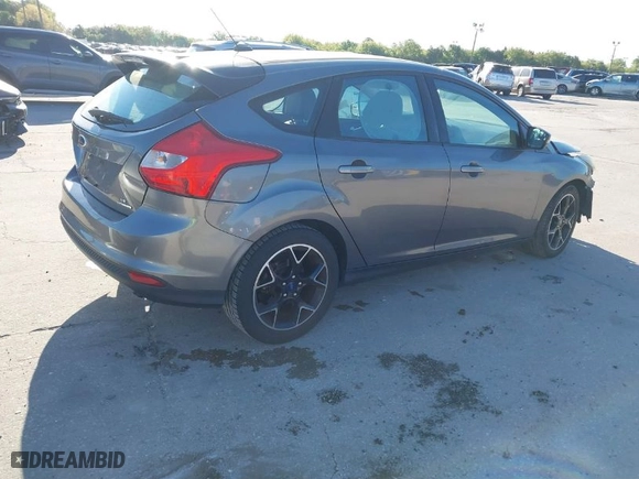 2013 Ford Focus SE with VIN 1FADP3K23DL249898, listed as a IAAI auction lot 41840265 with 112,800 mi miles. Bid and sale history available at carsss.com. Image 4.