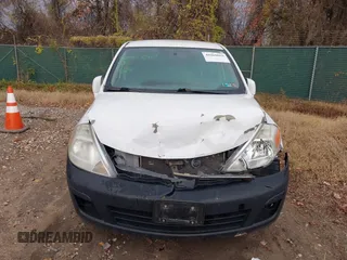 2009 Nissan Versa 1.8 S with VIN 3N1BC11E49L416720, listed as a IAAI auction lot 40960069 with 130,131 mi miles. Bid and sale history available at carsss.com. Image 12.