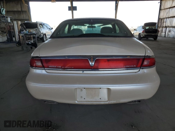 1997 Lincoln Mark VIII with VIN 1LNLM91V3VY602590, listed as a Copart auction lot 44431555 with 157,445 mi miles and Clean Title. Bid and sale history available at DreamBid. Image 6.