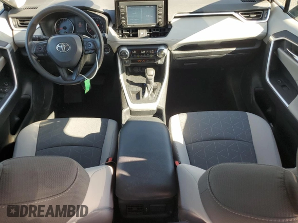 2020 Toyota RAV4 XLE with VIN 2T3W1RFV8LW070246, listed as a Copart auction lot 65072185 with 61,339 mi miles and Salvage title. Bid and sale history available at DreamBid. Image 8.