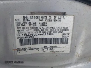 1997 Ford Taurus GL z VIN 1FALP52UXVG180596, wystawiony jako IAAI lot #42463461 z przebiegiem 190 419 mil mil oraz . Historia ofert i sprzedaży dostępna na DreamBid. Obrazek 9.