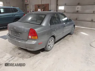 2004 Hyundai Accent GL with VIN KMHCG45C44U528783, listed as a IAAI auction lot 41535104 with 1 mi miles. Bid and sale history available at carsss.com. Image 4.