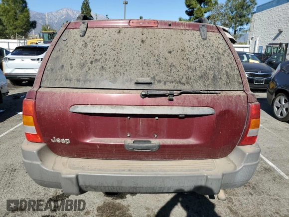 2002 Jeep Grand Cherokee Laredo with VIN 1J4GX48S52C265385, listed as a Copart auction lot 88823385 with 225,106 mi miles and Clean title. Bid and sale history available at DreamBid. Image 6.