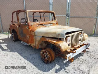 1993 Jeep Wrangler Sahara z VIN 1J4FY49SXPP221809, wystawiony jako IAAI lot #41461961 z przebiegiem Nie podano mil oraz . Historia ofert i sprzedaży dostępna na DreamBid. Obrazek 1.