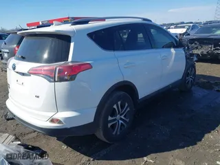 2017 Toyota RAV4 LE with VIN JTMZFREV8HJ111318, listed as a IAAI auction lot 41649660 with 117,018 mi miles. Bid and sale history available at carsss.com. Image 4.