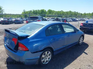 2006 Honda Civic LX with VIN JHMFA16586S000128, listed as a IAAI auction lot 42138350 with 127,253 mi miles and . Bid and sale history available at DreamBid. Image 4.