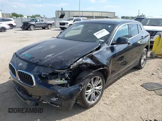 2018 BMW X2 xDrive28i z VIN WBXYJ5C37JEF71272, wystawiony jako IAAI lot #42073863 z przebiegiem 94 947 mil mil oraz . Historia ofert i sprzedaży dostępna na DreamBid. Obrazek 2.