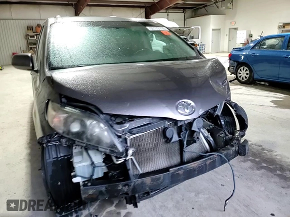 2011 Toyota Sienna SE with VIN 5TDXK3DCXBS159705, listed as a Copart auction lot 52173115 with 134,100 mi miles and Salvage Title. Bid and sale history available at carsss.com. Image 11.