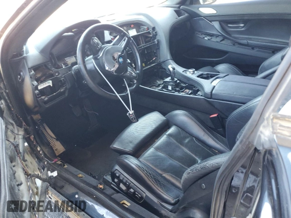 2014 BMW M6 z VIN WBSLX9C52ED160538, wystawiony jako Copart lot #64329095 z przebiegiem Nie podano mil oraz Szkoda całkowita • Salvage title. Historia ofert i sprzedaży dostępna na DreamBid. Obrazek 8.