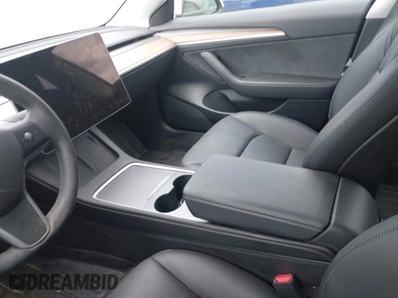 2023 Tesla Model 3 z VIN 5YJ3E1EA5PF503654, wystawiony jako IAAI lot #42622031 z przebiegiem 28 476 mil mil oraz . Historia ofert i sprzedaży dostępna na DreamBid. Obrazek 5.