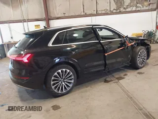 2019 Audi e-tron Prestige with VIN WA1VABGE1KB008769, listed as a IAAI auction lot 41412414 with 41,072 mi miles and . Bid and sale history available at DreamBid. Image 4.