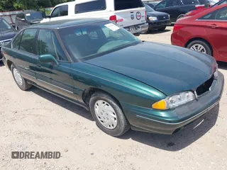 1997 Pontiac Bonneville SE z VIN 1G2HX52K3VH266314, wystawiony jako IAAI lot #42270685 z przebiegiem 169 838 mil mil oraz . Historia ofert i sprzedaży dostępna na DreamBid. Obrazek 1.