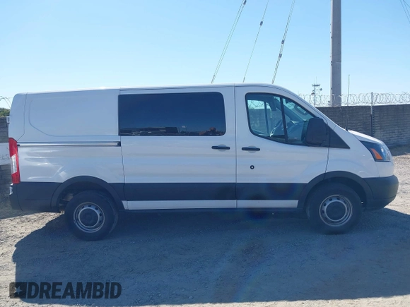 2019 Ford Transit z VIN 1FTYR1YM4KKA83624, wystawiony jako IAAI lot #42651250 z przebiegiem 118 838 mil mil oraz . Historia ofert i sprzedaży dostępna na DreamBid. Obrazek 13.
