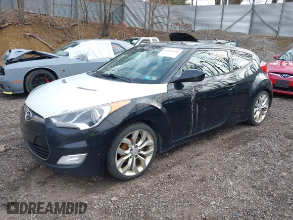2012 Hyundai Veloster w/Black Int with VIN KMHTC6AD6CU020657, listed as a IAAI auction lot 42031670 with 187,585 mi miles and . Bid and sale history available at DreamBid. Image 2.