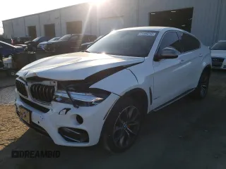 2016 BMW X6 xDrive35i with VIN 5UXKU2C57G0N81828, listed as a Copart auction lot 71186212 with 134,114 mi miles. Bid and sale history available at carsss.com. Image 1.