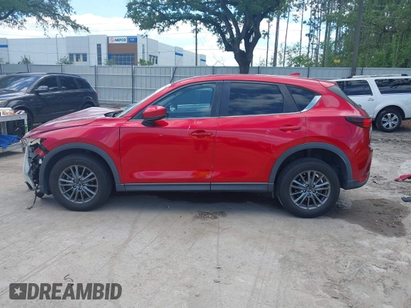 2019 Mazda CX-5 Touring with VIN JM3KFACM6K1549234, listed as a IAAI auction lot 42036633 with 85,065 mi miles and . Bid and sale history available at carsss.com. Image 15.