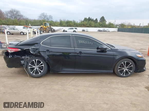 2018 Toyota Camry LE z VIN JTNB11HK6J3005121, wystawiony jako IAAI lot #42065784 z przebiegiem 114 907 mil mil oraz . Historia ofert i sprzedaży dostępna na DreamBid. Obrazek 13.